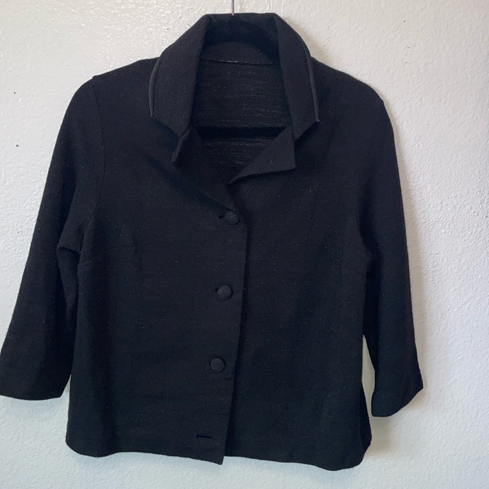 Black knit vintage jacket  3/4sleeves  fabric covered buttons. Sparkles of grey